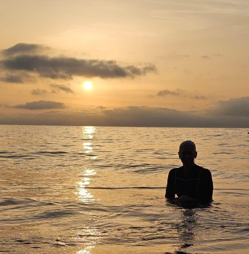 Swimming at sunset